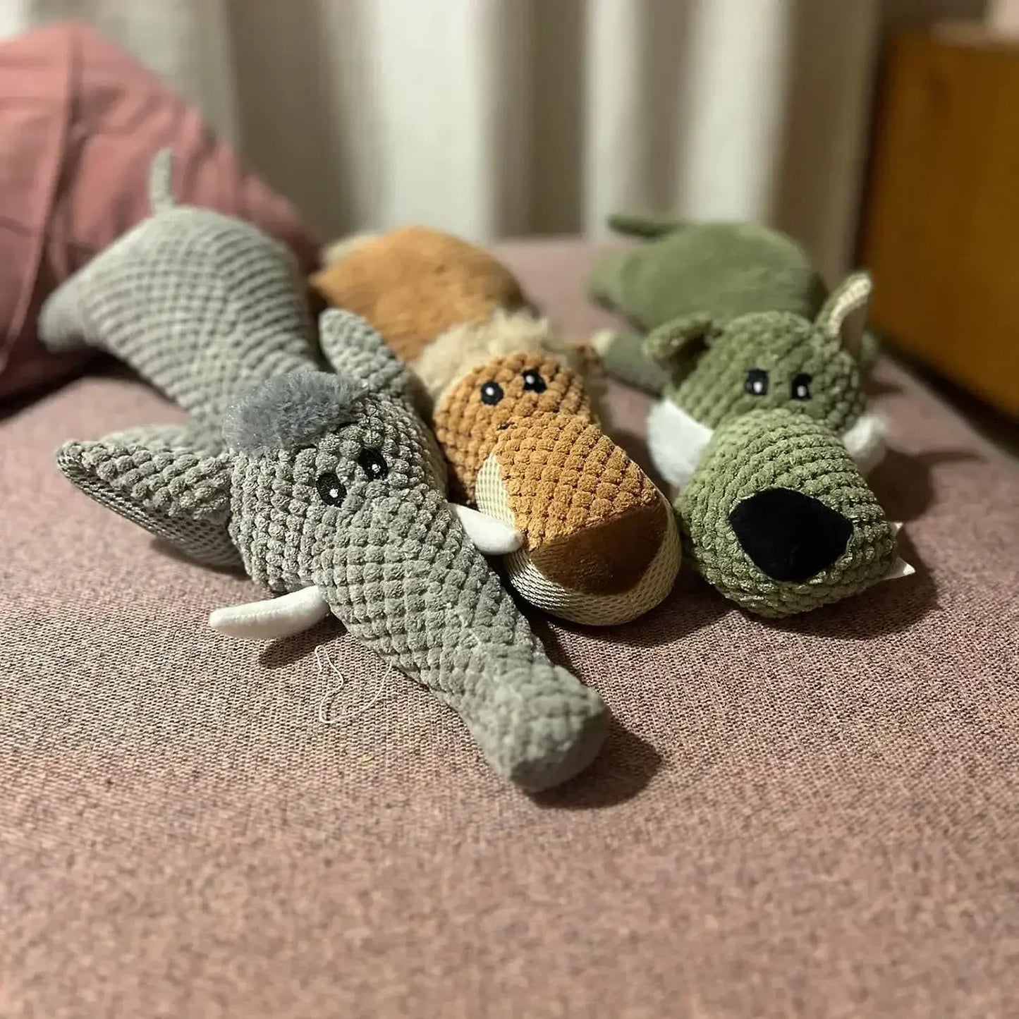 Squeaking dog plushie